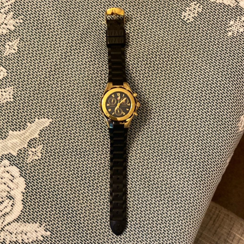 Michele Tahitian watch with black and gold face and black rubber strap
